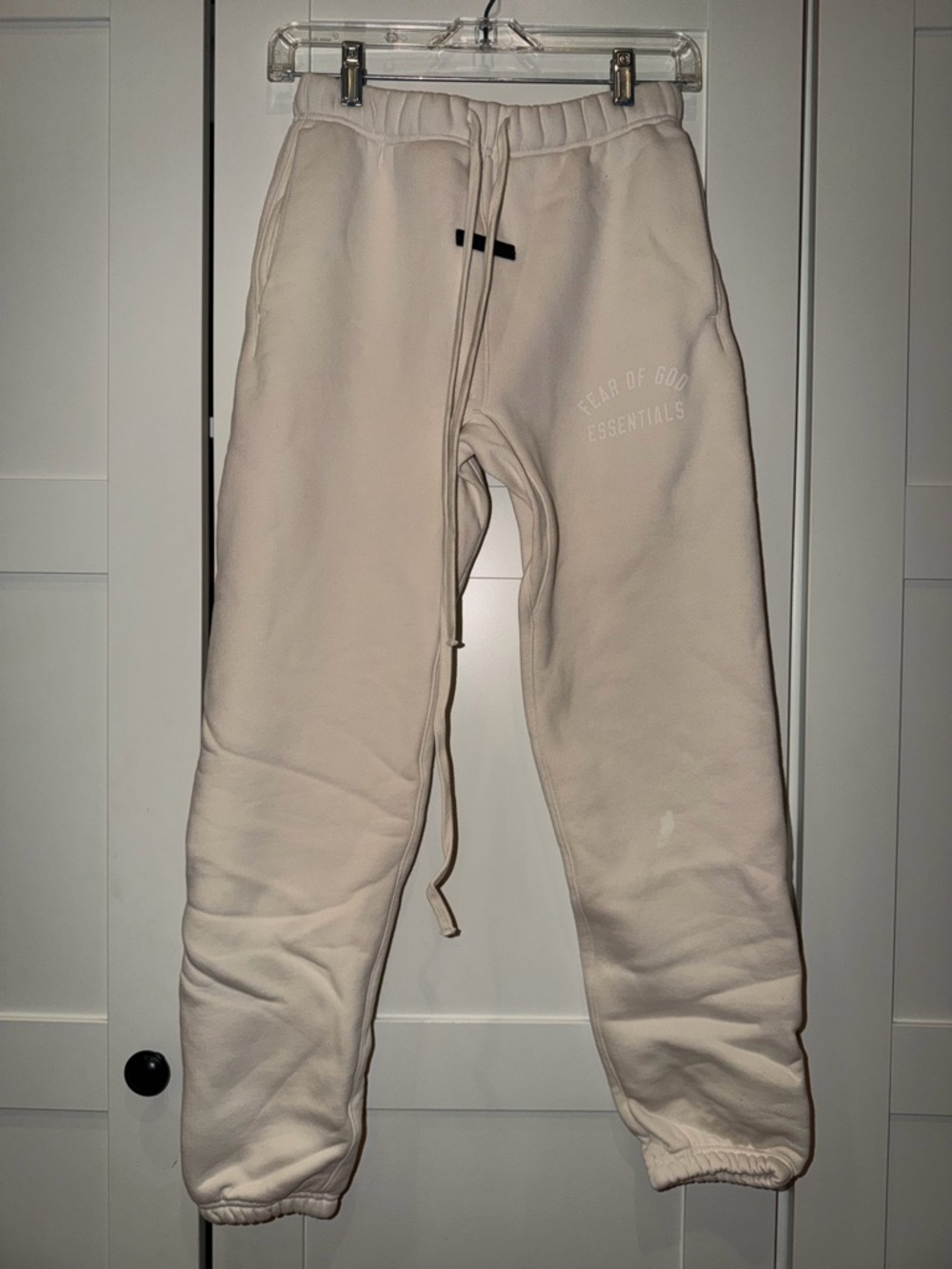 Fear of God Essentials Track Pants in Cream